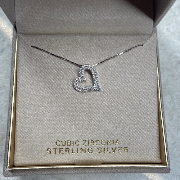 PRIMROSE Jewelry - Sterling Silver Floating Heart Pendant Necklace with Cubic Zirconia Stones.